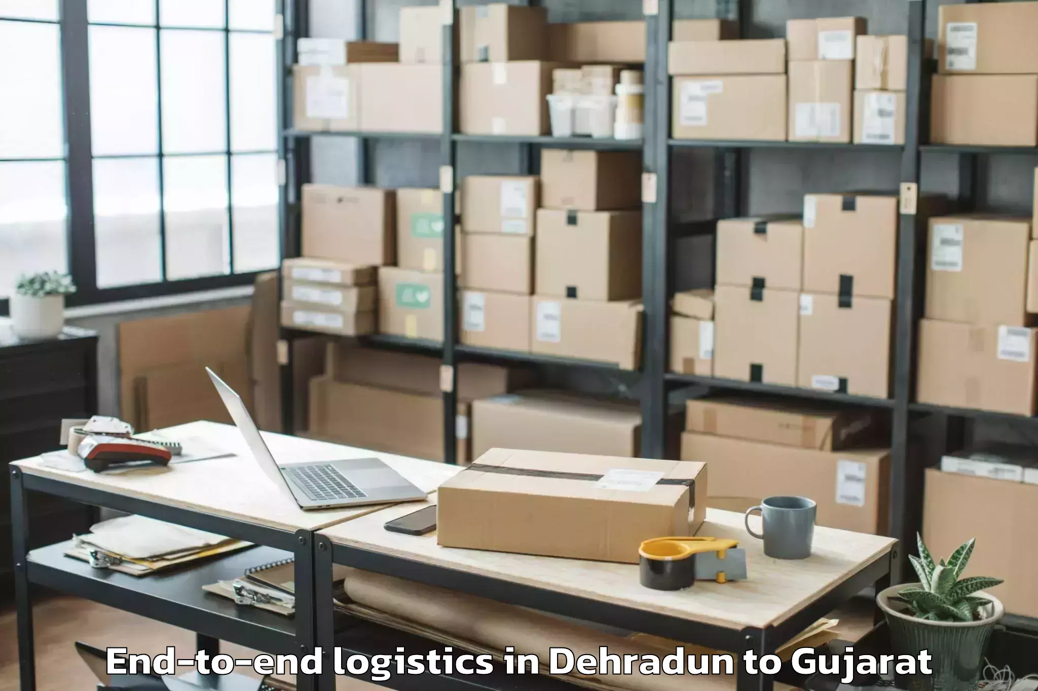 Top Dehradun to Jamkandorna End To End Logistics Available